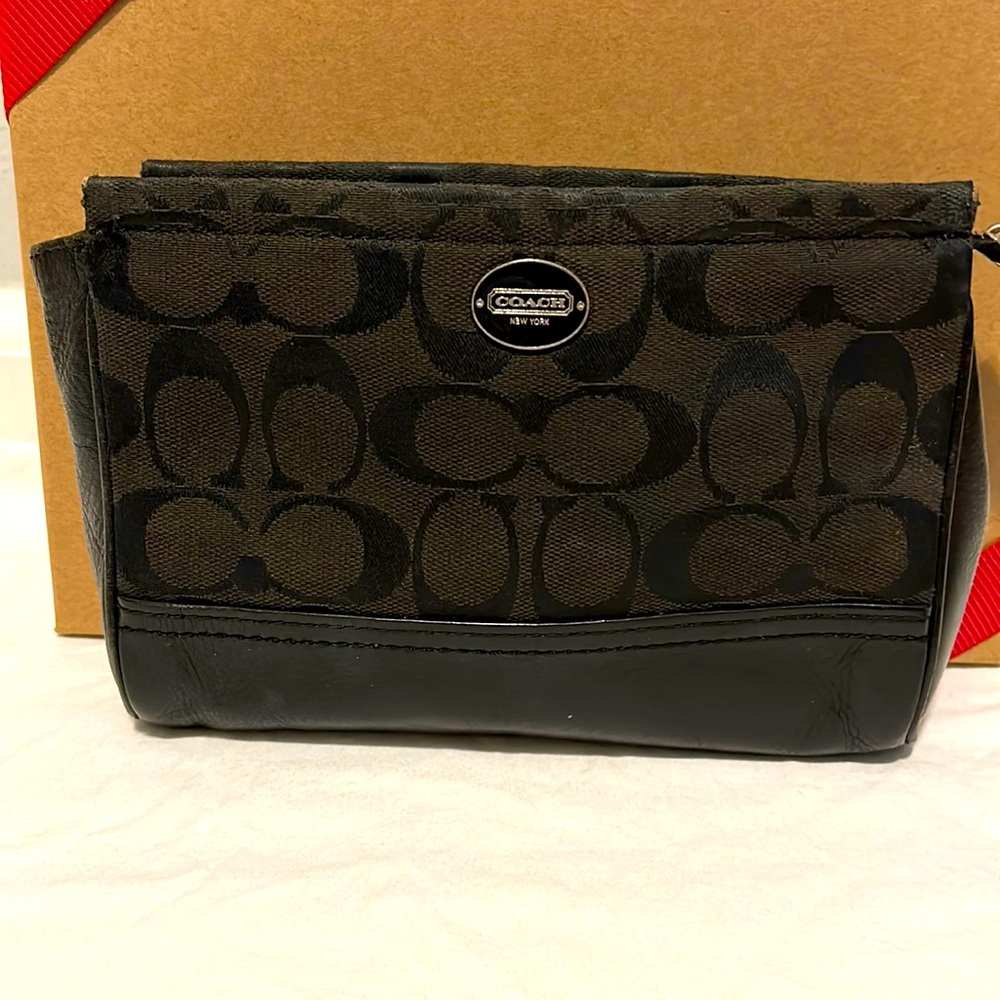 Coach small makeup/travel bag.